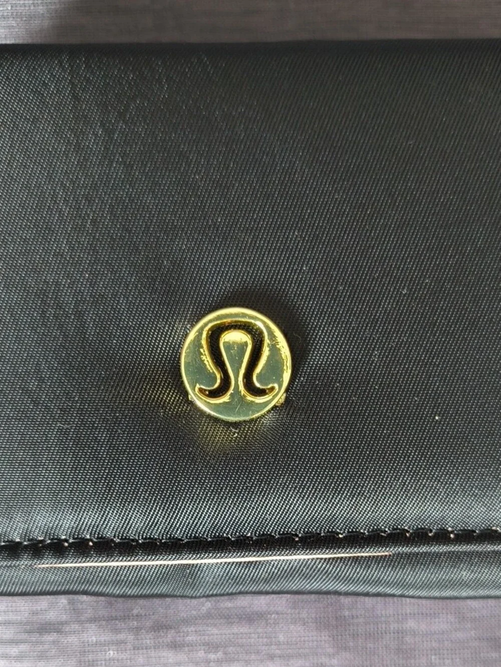 Lululemon Athletica Black Wallet with Gold Accents